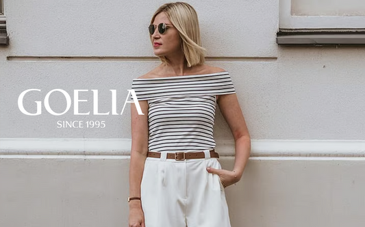 A woman wears off shoulder striped top in summer