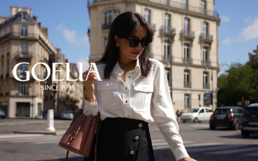 a lady in a white shirt and a black skirt