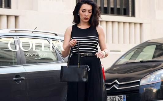 a lady in a black striped tank top and a pair of black culottes