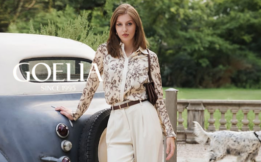 a lady in a floral printed shirt and a pair of white pants