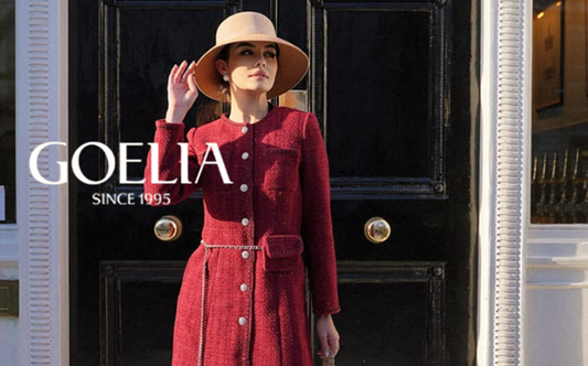 a lady in a red tweed dresss and a wide-brim hat