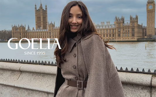 a lady wears a light brown cloak 