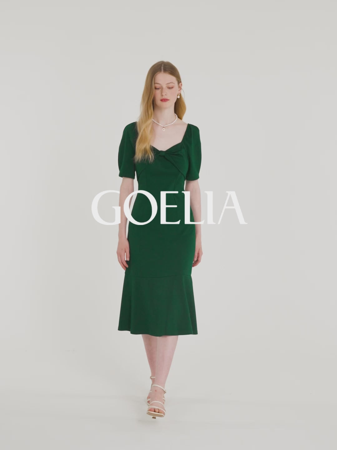 Vestido midi verde oscuro con lazo